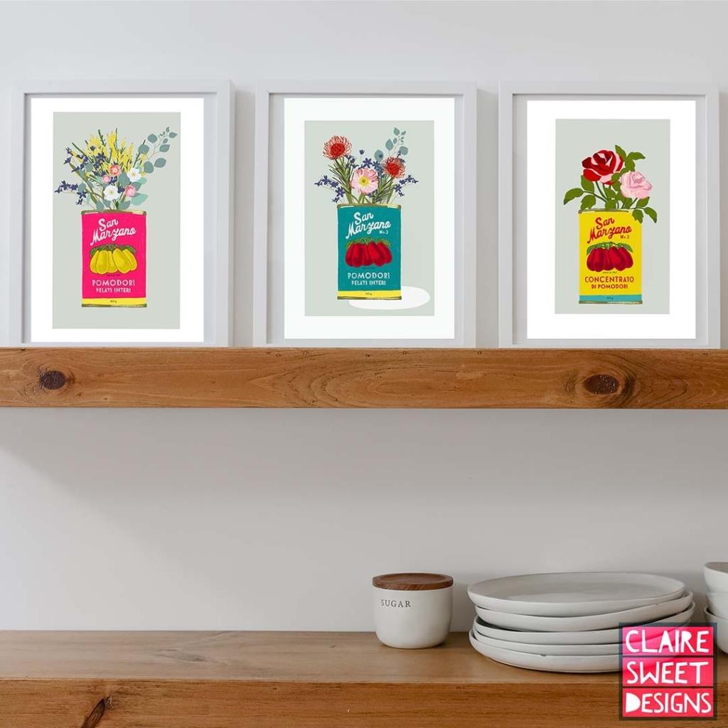 Set of 3 graphic prints of flowers in brightly coloured San Marzano tomato tins by Claire Sweet.