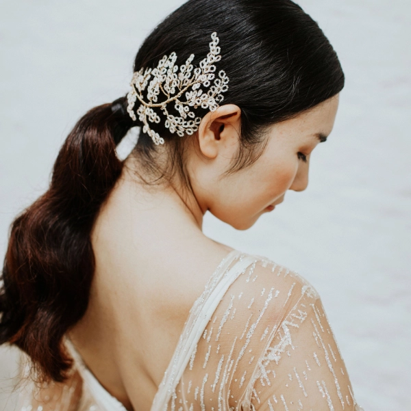 Clare Lloyd Accessories - wedding hair piece styled as plant frond, in ivory and gold colours.